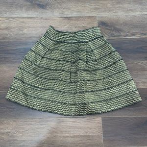 Worn once gold stretch puffy skirt with zipper